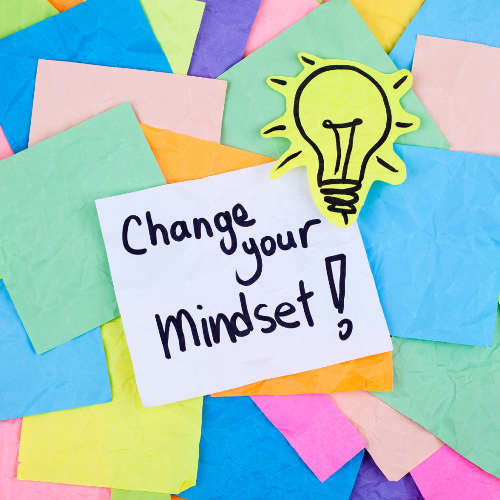 Post-Its with "Change Your Mindset" on them