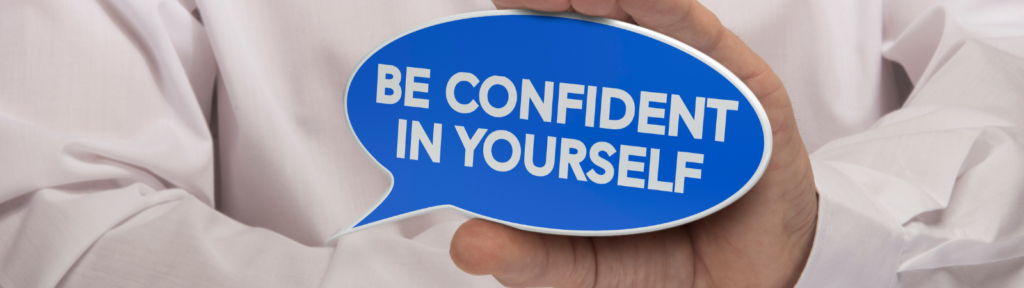 Sign that says "Be confident in yourself"