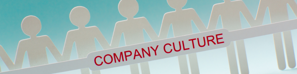 paper cutouts of people holding a sign that says "Company Culture"